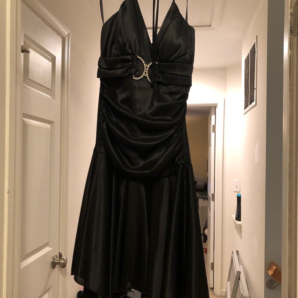 Woman’s black medium cocktail dress